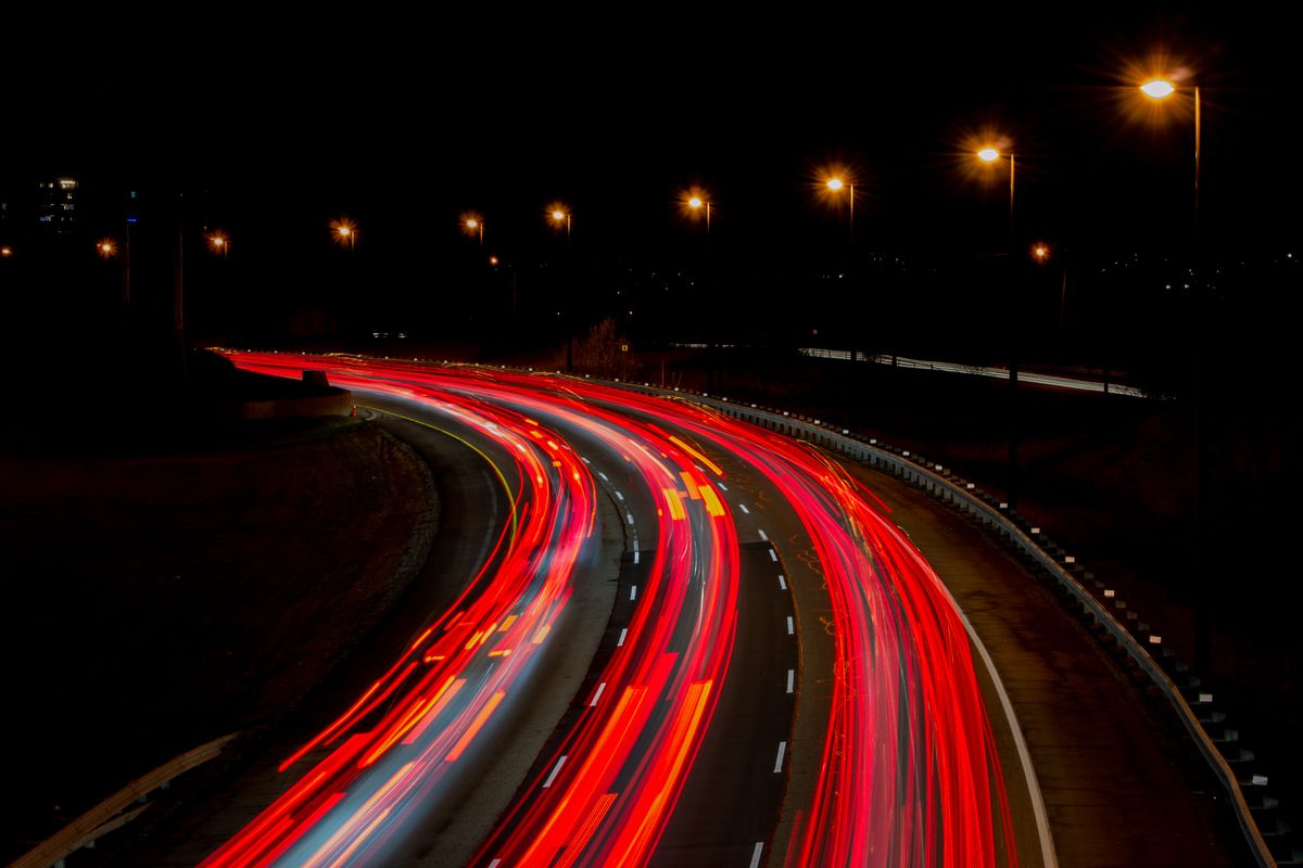 Night motorway with vehicle light trails